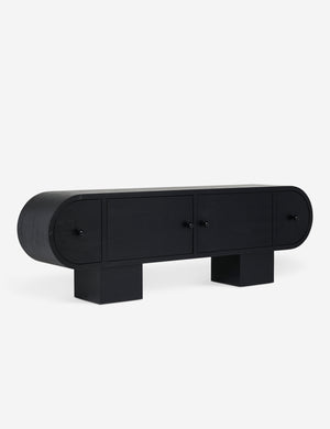 Angled view of the Laughlin retro pill shaped sideboard cabinet in black