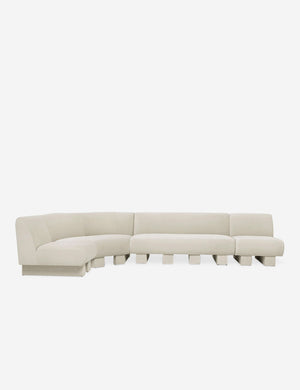 Lena left-facing white boucle sectional sofa with upholstered beam legs.