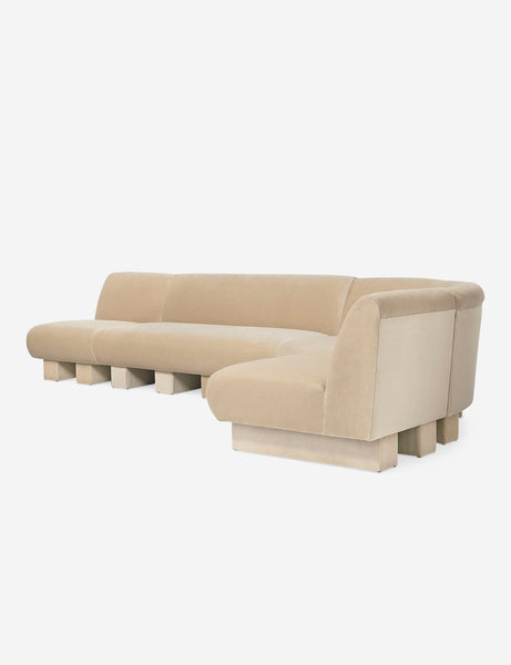#color::brie-classic-velvet #configuration::right-facing #size::142-W | Angled view of the Lena right-facing beige velvet sectional sofa with upholstered beam legs 