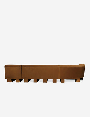 Rear view of the entire Lena left-facing cognac velvet sectional sofa with upholstered beam legs.