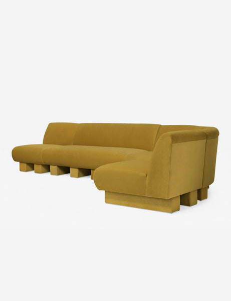 #color::goldenrod-plush-velvet #configuration::right-facing #size::142-W | Angled view of the Lena right-facing yellow velvet sectional sofa with upholstered beam legs.