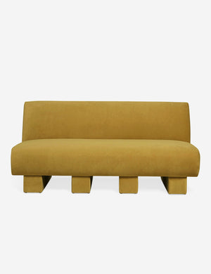 Centerpiece of the Lena yellow velvet sectional sofa with upholstered beam legs