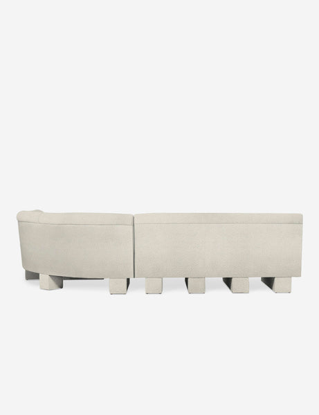 #color::Ivory-Boucle #configuration::right-facing #size::114-W | Rear view of the entire Lena left-facing white boucle sectional sofa with upholstered beam legs.