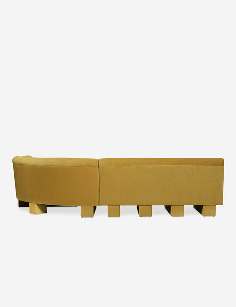 #color::goldenrod-plush-velvet #configuration::right-facing #size::114-W | Rear view of the entire Lena right-facing yellow velvet sectional sofa with upholstered beam legs.