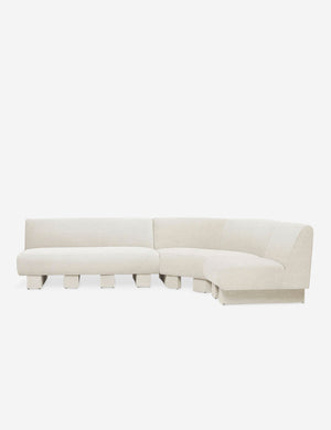 Lena right-facing natural linen sectional sofa with upholstered beam legs.