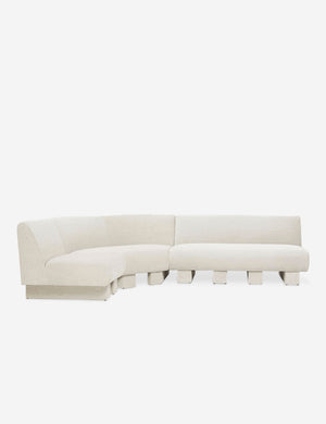 Lena left-facing natural linen sectional sofa with upholstered beam legs.