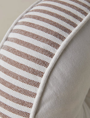 Close up of the Littu Indoor / Outdoor Striped Disc Pillow by Sarah Sherman Samuel in Brown