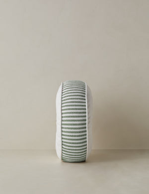 Side profile of the Littu Indoor / Outdoor Striped Disc Pillow by Sarah Sherman Samuel in Moss