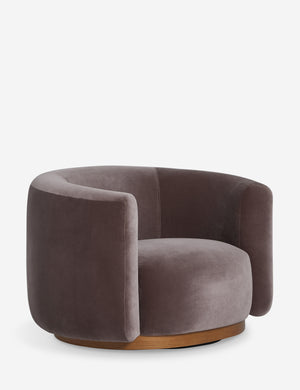 Angled view of the Lowry rounded silhouette velvet accent chair.