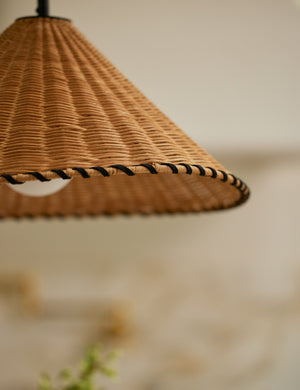 Close up of the shade of the Terrene Woven Rattan Pendant by Elan Byrd.