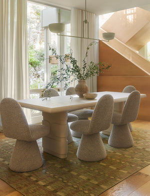 Dining room featuring the Fenton textured sculptural upholstered minimalist dining chair.