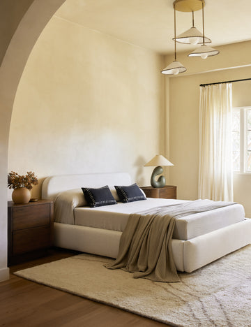 #style::black-lumbar | Accord Black Linen Lumbar Pillow by Elan Byrd styled in a bedroom.