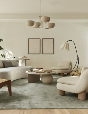 Living room featuring the Lozano chunky low-profile armless accent chair.