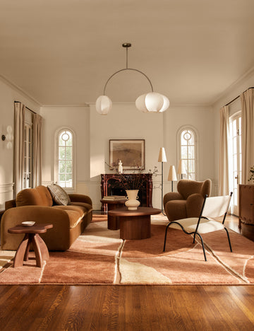 #color::dark-pewter | Luneth arc-shape lantern shade linear chandelier by Aimee Song hanging in a living room