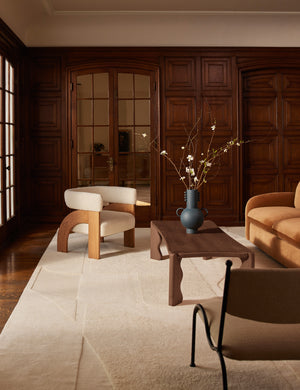 Living room featuring the Malta Hi-Lo Pile Hand-Knotted Wool Rug by Aimee Song