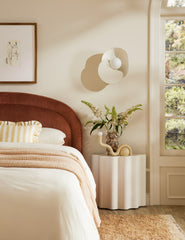 #color::ivory #size::tall | Lune half-moon, scalloped concrete side table styled as a nightstand
