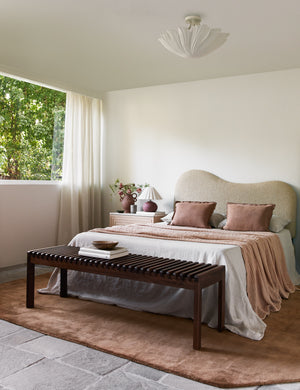 Bedroom featuring the Damara solid viscose rug in rose.