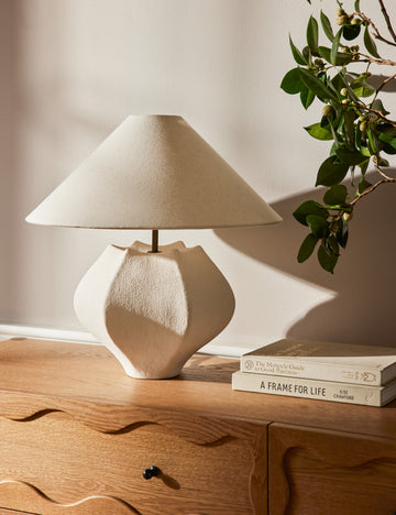 #color::ivory | Punto sculptural ceramic table lamp by Aimee Song styled on top of a dresser