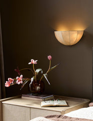 #color::cream | Mahan linen up-ight wall sconce hung above a nightstand