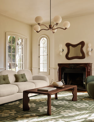 Living room featuring the Carlisle Geometric Motif Hand-Knotted Wool Rug by Aimee Song