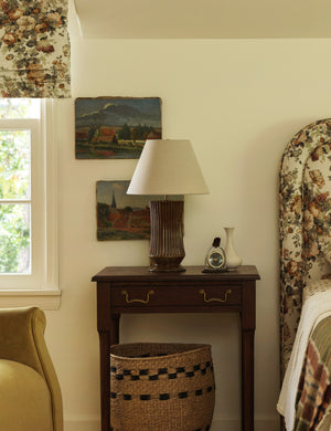 Alta fluted ceramic base table lamp by Heidi Caillier styled on a nightstand