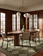 #color::cool-brown | Dining room featuring the Nave modern sculptural red oak dining table by Aimee Song