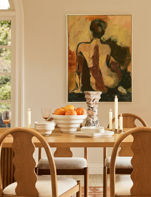 #color::ivory | Cascading matte ceramic serving bowl styled on a dining table