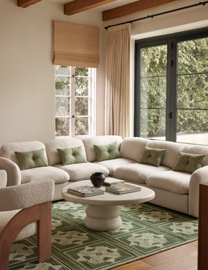 Welby striped tufted button linen throw pillow by Aimee Song styled on a sofa