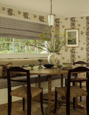 #color::cream-and-aged-brass #size::10-dia | Frederick tapered glass shade chain pendant light by Heidi Caillier hung over a dining table