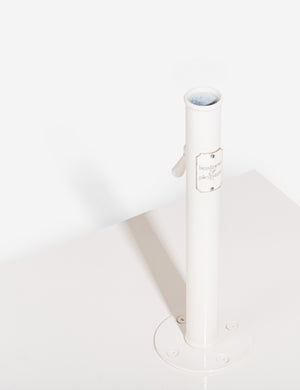 Angled view of the  pole-insert inside the neck of the Classic white umbrella base by business and pleasure co