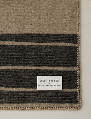 Corner of the Checkered wool throw blanket in black and beige