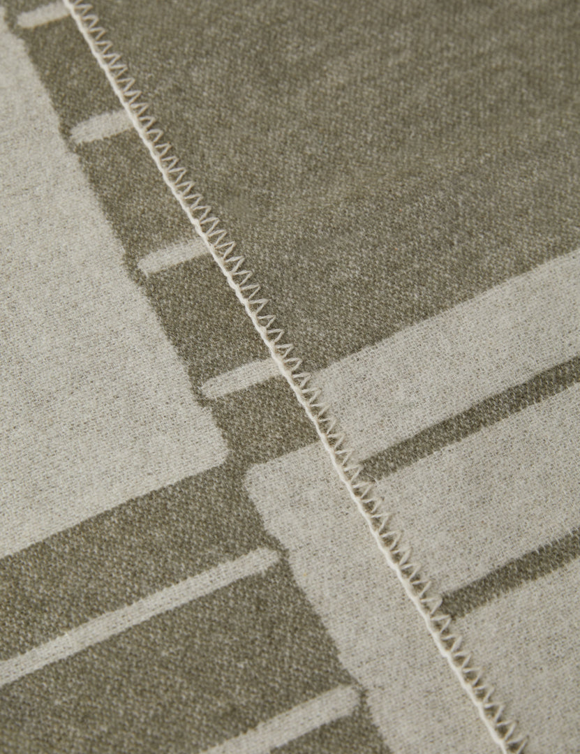 #color::ivory-and-olive | Close up view of the Checkered wool throw blanket in ivory and olive