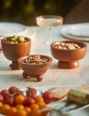 #color::acacia | Set of three mini footed walnut bowls by Sarah Sherman Samuel