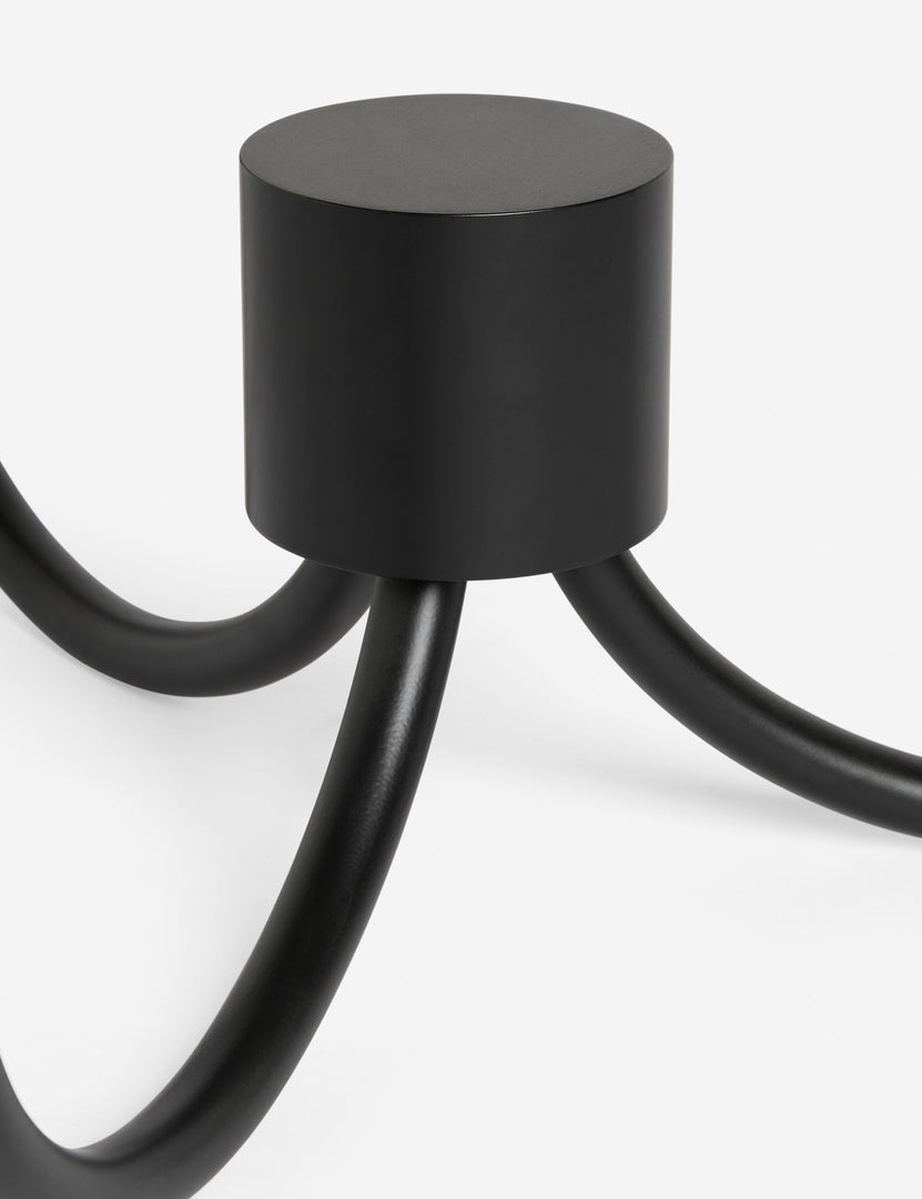 #color::black | Close up view of the base of the Familia slim 3-tapered shade floor lamp by Aimee Song
