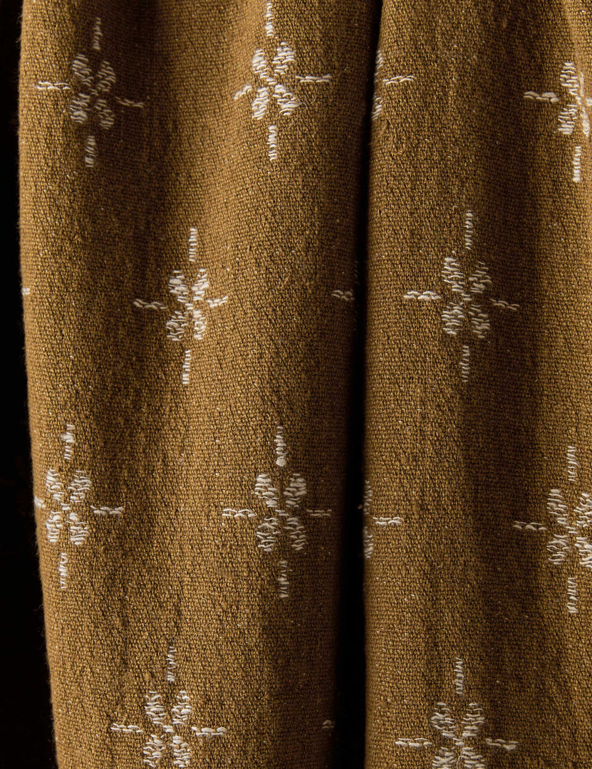 #color::marigold-and-ivory | Close up of the Fania lightweight linen-cotton blend floral motif throw.