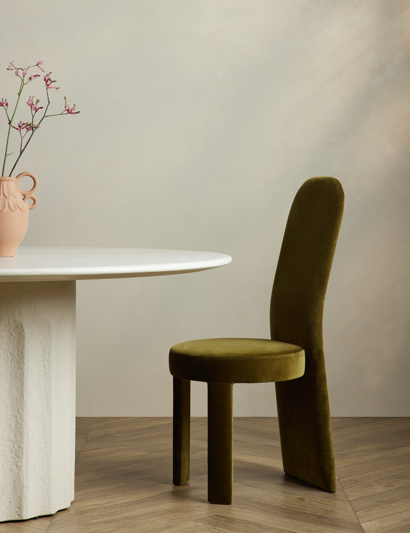 #color::green-velvet | Halbrook upholstered tall back sculptural dining chair in green velvet at a dining table