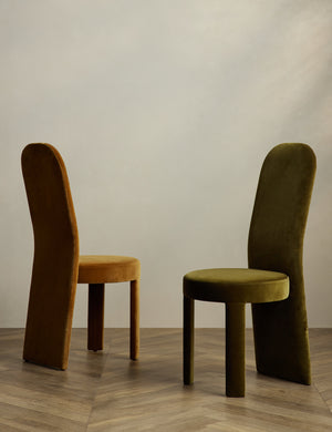 Halbrook upholstered tall back sculptural dining chairs in green velvet and sienna velvet