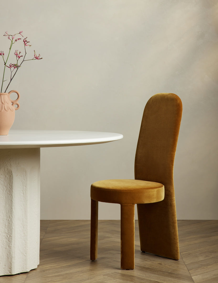 #color::sienna-velvet | Halbrook upholstered tall back sculptural dining chair in sienna velvet at a dining table