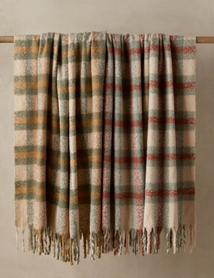 Both colorways of the Haldar chunky tasseled edge plaid throw.