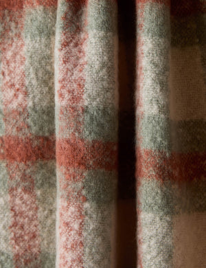 Close up of the Haldar chunky tasseled edge plaid throw.