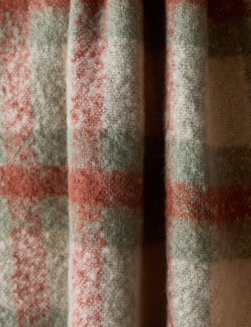 #color::sage-and-rust | Close up of the Haldar chunky tasseled edge plaid throw.