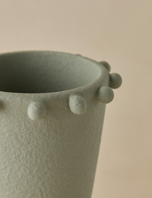 Close up view of the Idra tall round handle ceramic vase by Aimee Song
