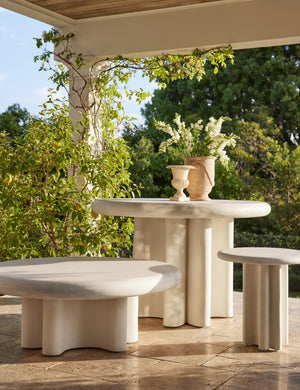 Ruiz round cement outdoor table collection.