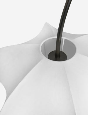 Close up of the Luneth arc-shape lantern shade linear chandelier by Aimee Song