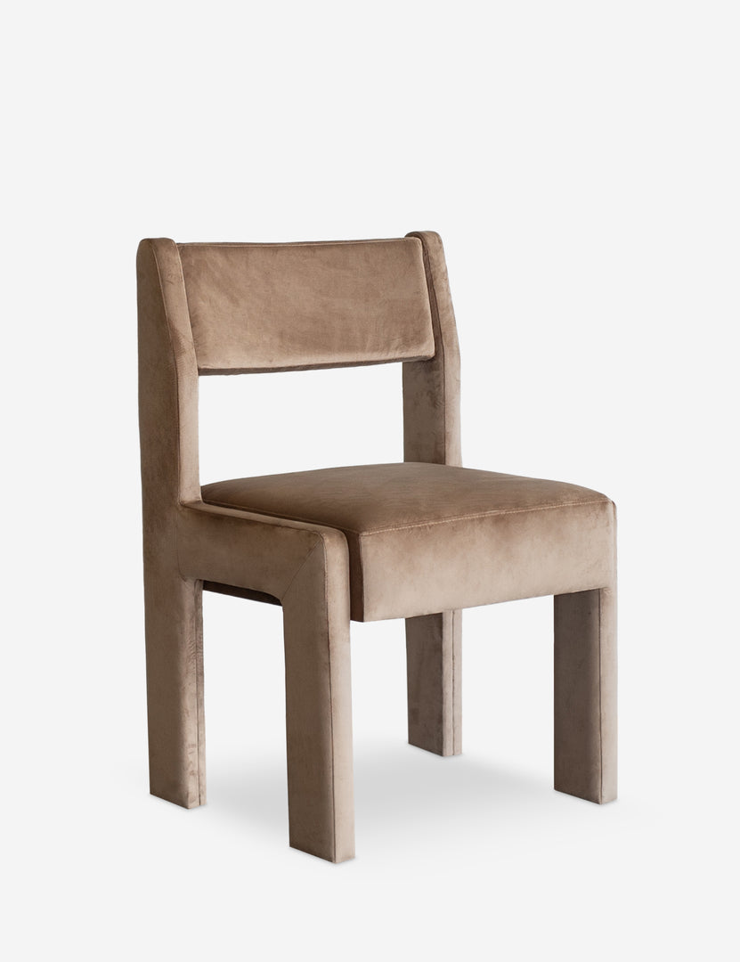 Black velvet dining chair with squared legs and backrest, front view.