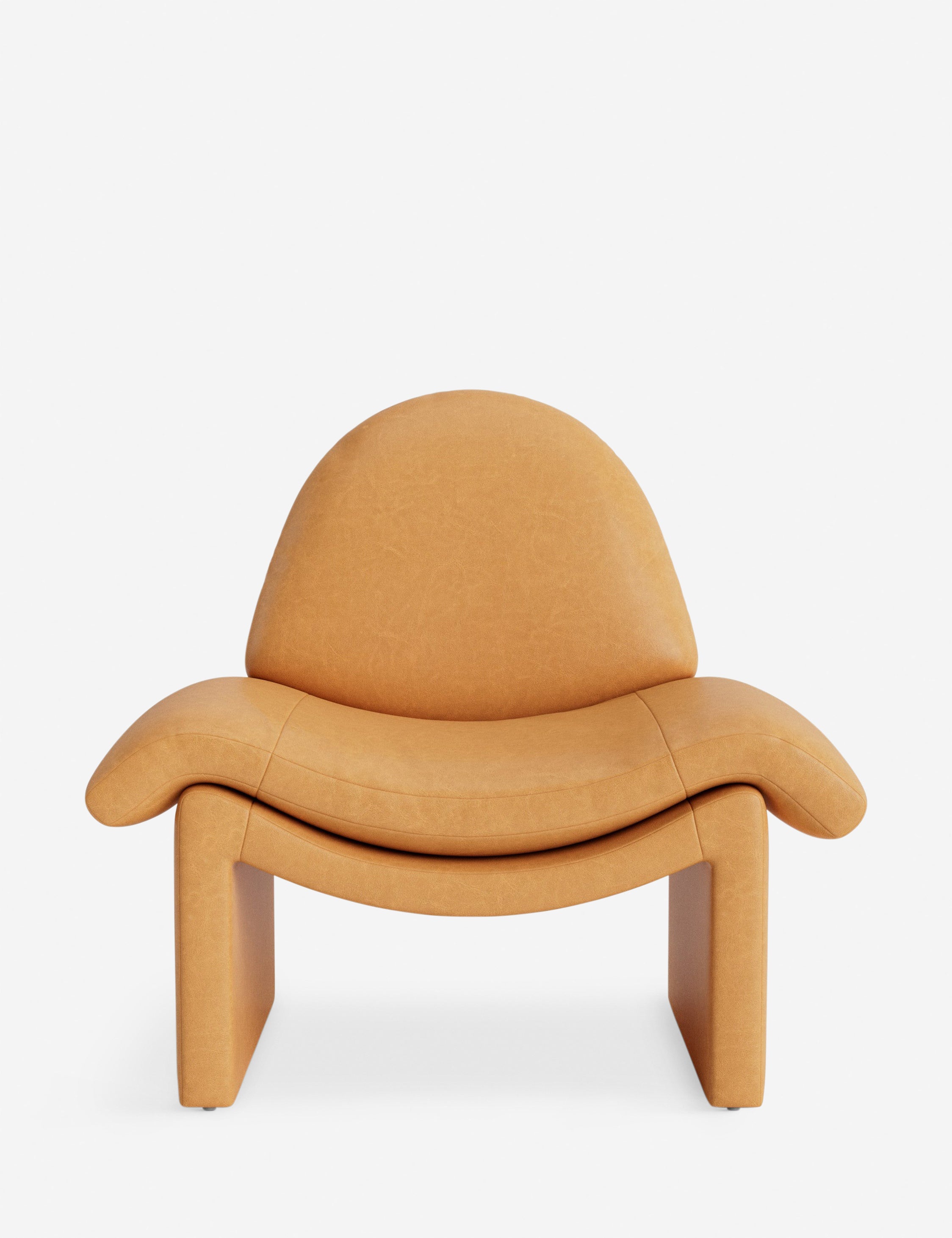 #color::saddle-leather | Nolina relaxed open profile leather accent chair by Carly Cushnie.