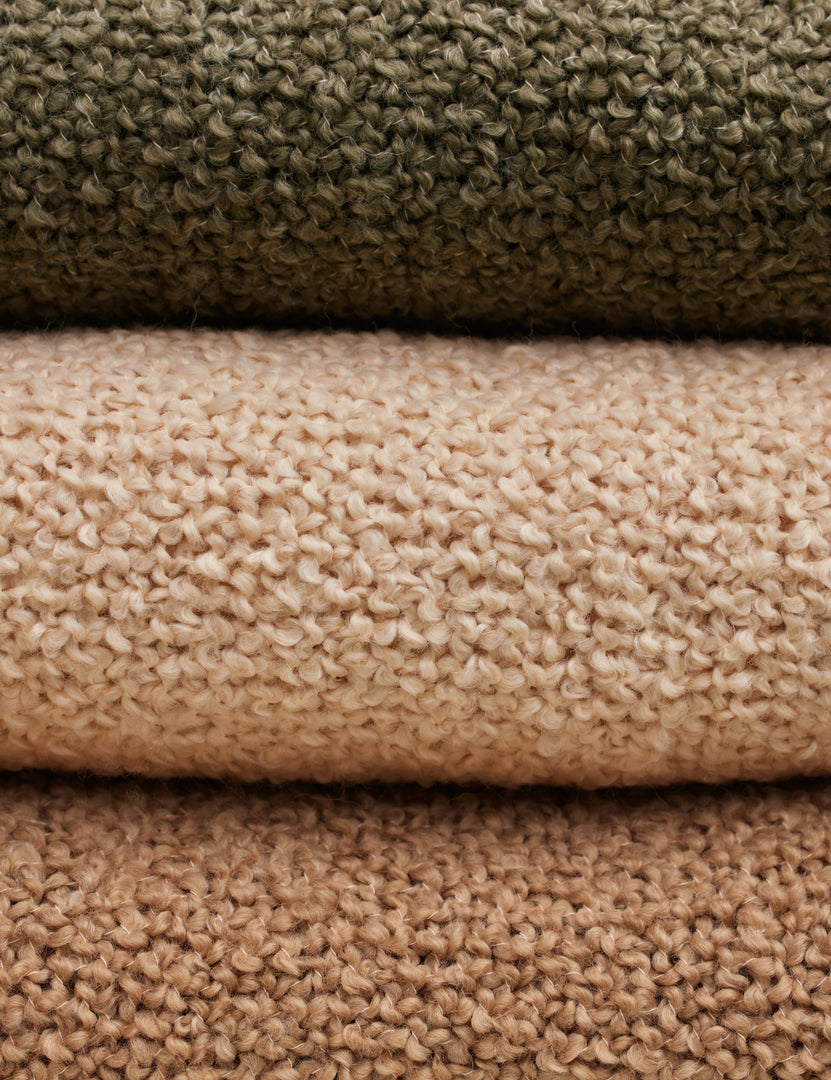 #color::terracotta #color::moss #color::natural | Close up of all three colors of the Jaffe chunky knit fringed outdoor throw blanket.