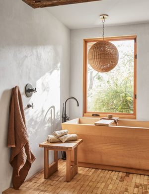 Maritza light wood and woven seagrass coastal style side table.