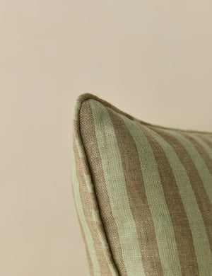 Close up view of the corner of the Welby striped tufted button linen throw pillow by Aimee Song