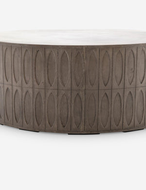 Close-up of the accented side on the Mal concrete indoor and outdoor round coffee table
